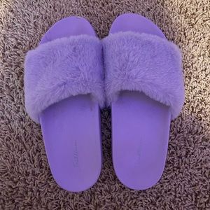 Purple slides with fuzzy top